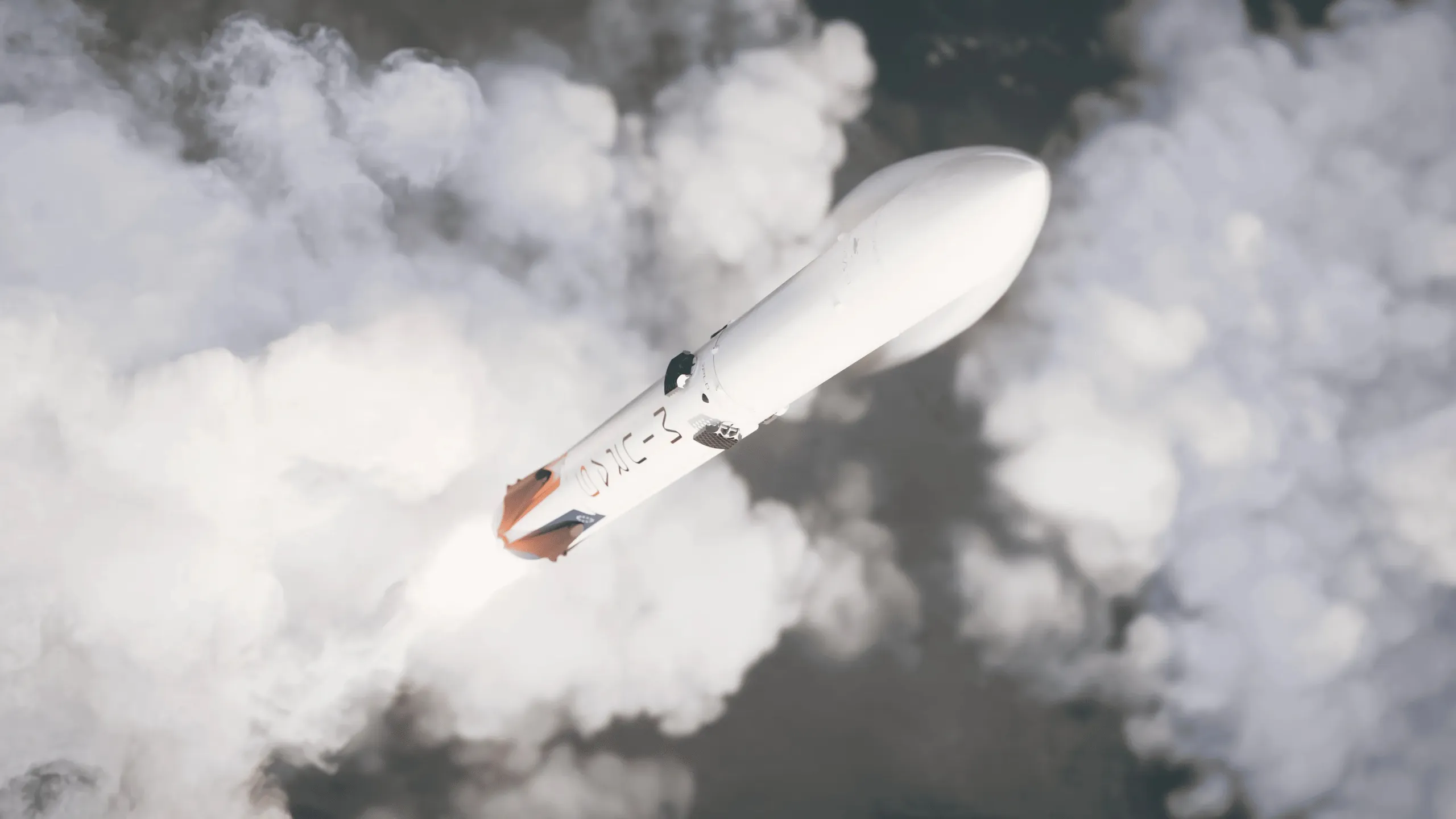 A rendering of a white rocket seen from above as it climbs through billowing clouds of exhaust, small grid fins near the top of its first stage